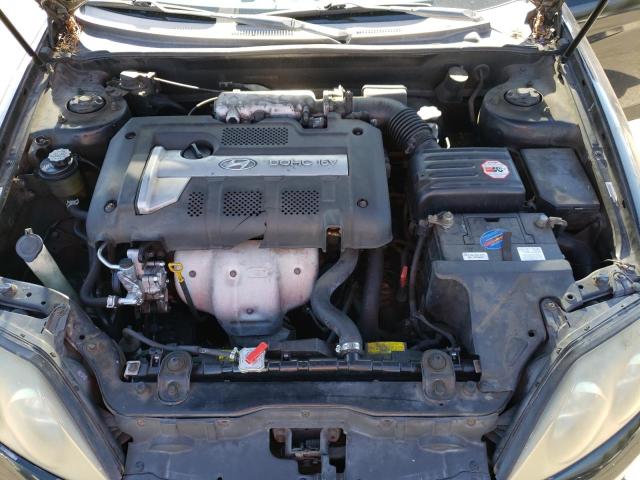 Photo 7 from auction – 2003 HYUNDAI TIBURON with VIN KMHHM65D33U098939