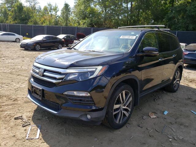 Photo 2 from auction – 2016 HONDA PILOT TOUR with VIN 5FNYF6H94GB103814