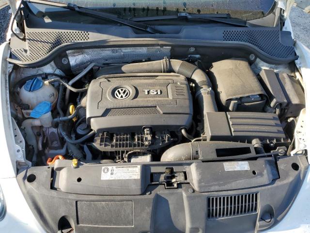 Photo 7 from auction – 2015 VOLKSWAGEN BEETLE 1.8 with VIN 3VWF17AT0FM604790