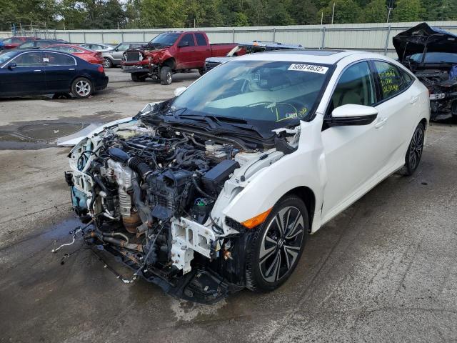 Photo 2 from auction – 2016 HONDA CIVIC EX with VIN 2HGFC1F34GH656296
