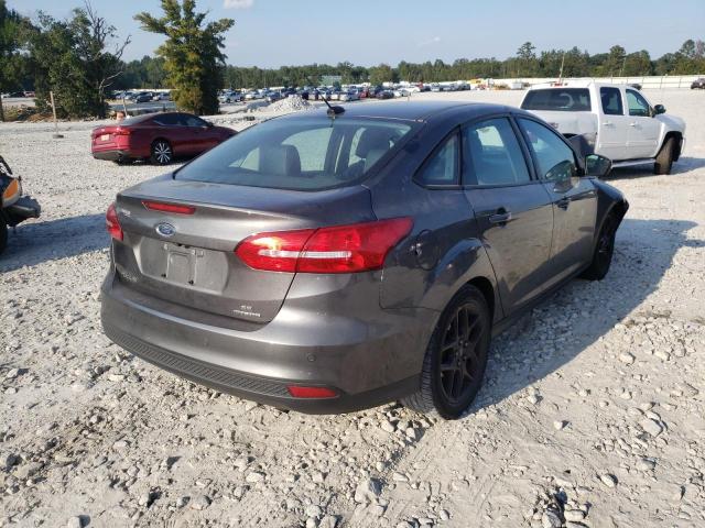 Photo 4 from auction – 2016 FORD FOCUS SE with VIN 1FADP3F21GL262244