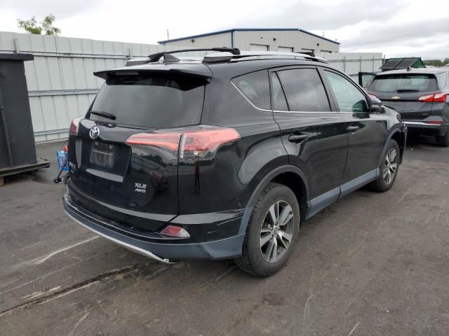 Photo 4 from auction – 2016 TOYOTA RAV4 XLE with VIN 2T3RFREV4GW467703