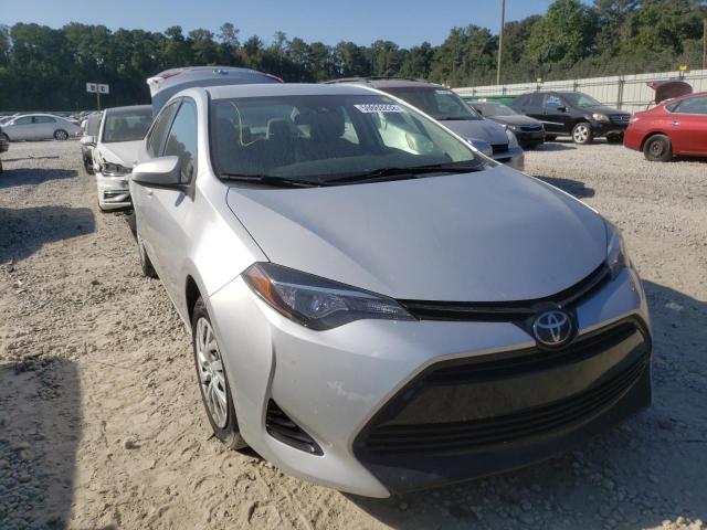 TOYOTA COROLLA L 2018 with VIN 5YFBURHE7JP773864 - Photo from auction