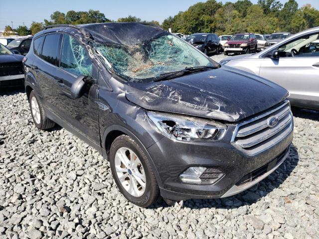 FORD ESCAPE 2018 with VIN 1FMCU0GD0JUA75197 - Photo from auction