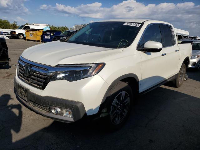 Photo 2 from auction – 2019 HONDA RIDGELINE with VIN 5FPYK3F75KB009873
