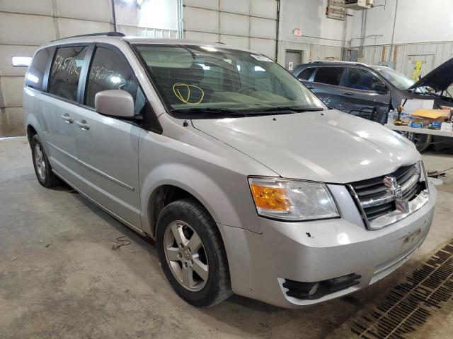 DODGE GRAND CARA 2010 with VIN 2D4RN5D17AR127105 - Photo from auction