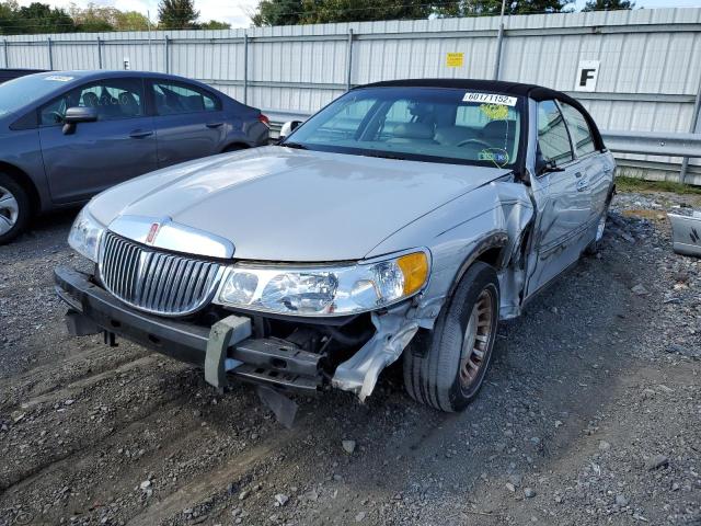 Photo 2 from auction – 2000 LINCOLN TOWN CAR E with VIN 1LNHM81W0YY935651