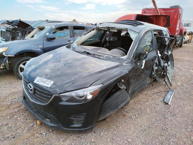 Photo 2 from auction – 2016 MAZDA CX-5 TOURI with VIN JM3KE2CY4G0675357