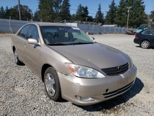 TOYOTA CAMRY LE 2002 with VIN JTDBE32K720136719 - Photo from auction