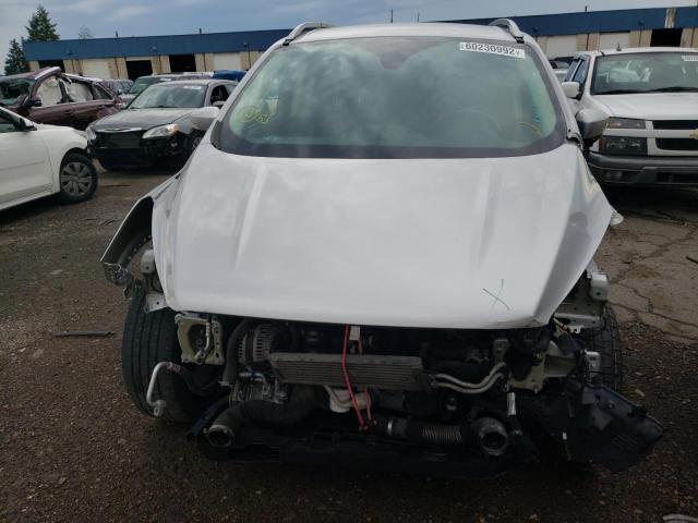Photo 9 from auction – 2017 FORD ESCAPE TIT with VIN 1FMCU9J98HUD65383