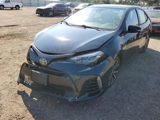 Photo 2 from auction – 2017 TOYOTA COROLLA with VIN 2T1BURHE1HC822695