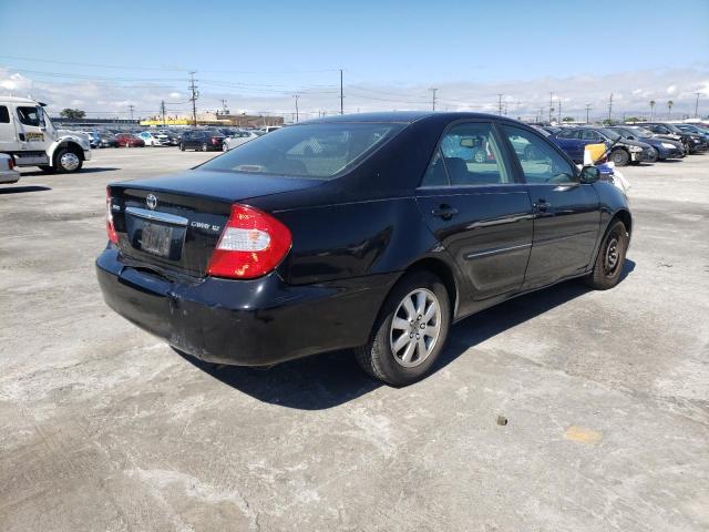 Photo 4 from auction – 2003 TOYOTA CAMRY LE with VIN JTDBE32K930242283