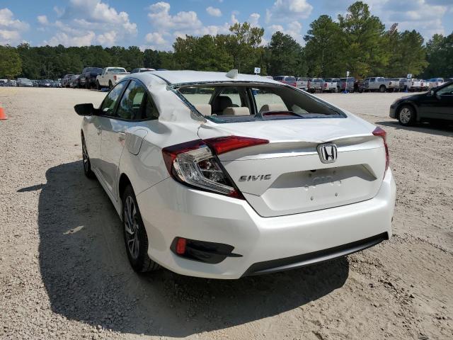 Photo 3 from auction – 2018 HONDA CIVIC EX with VIN 19XFC2F75JE209826