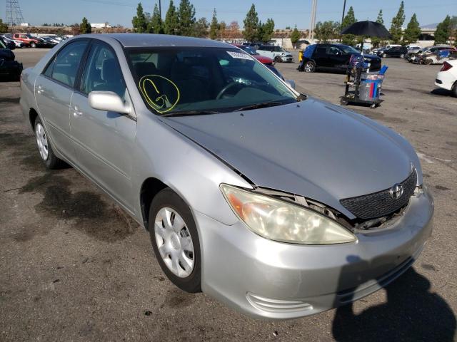 TOYOTA CAMRY LE 2004 with VIN 4T1BE32K04U878452 - Photo from auction