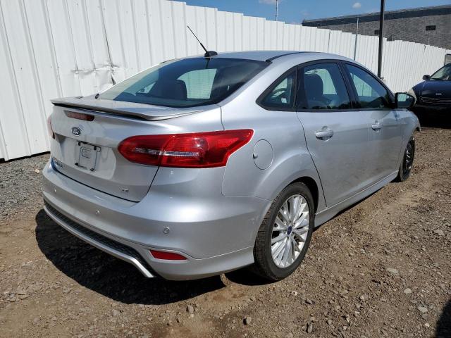 Photo 4 from auction – 2015 FORD FOCUS SE with VIN 1FADP3F23FL285409
