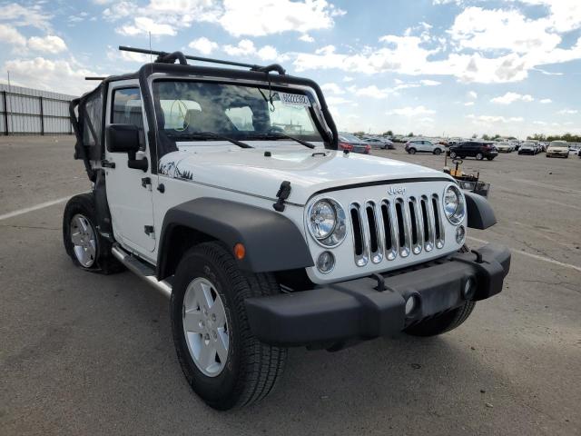 JEEP WRANGLER S 2015 with VIN 1C4AJWAG4FL743560 - Photo from auction