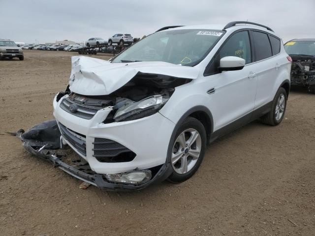 Photo 2 from auction – 2014 FORD ESCAPE SE with VIN 1FMCU9GX0EUB72257