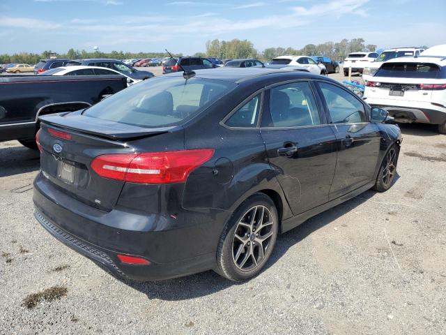 Photo 4 from auction – 2016 FORD FOCUS SE with VIN 1FADP3F21GL392864