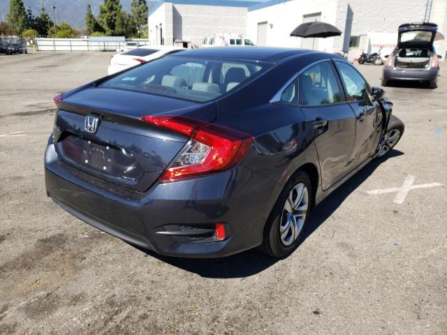Photo 4 from auction – 2018 HONDA CIVIC LX with VIN 2HGFC2F54JH560439