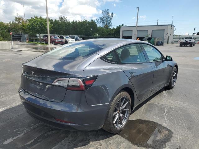 Photo 4 from auction – 2021 TESLA MODEL 3 with VIN 5YJ3E1EAXMF090416
