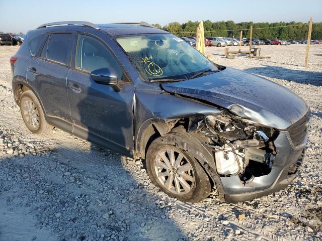 MAZDA CX-5 TOURI 2016 with VIN JM3KE2CY6G0878170 - Photo from auction