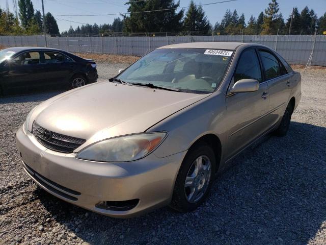 Photo 2 from auction – 2002 TOYOTA CAMRY LE with VIN JTDBE32K720136719