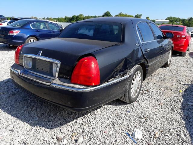 Photo 4 from auction – 2003 LINCOLN TOWN CAR E with VIN 1LNHM81W13Y613092