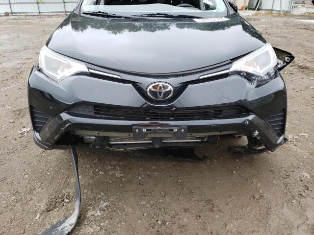 Photo 9 from auction – 2018 TOYOTA RAV4 LE with VIN 2T3BFREV7JW731232