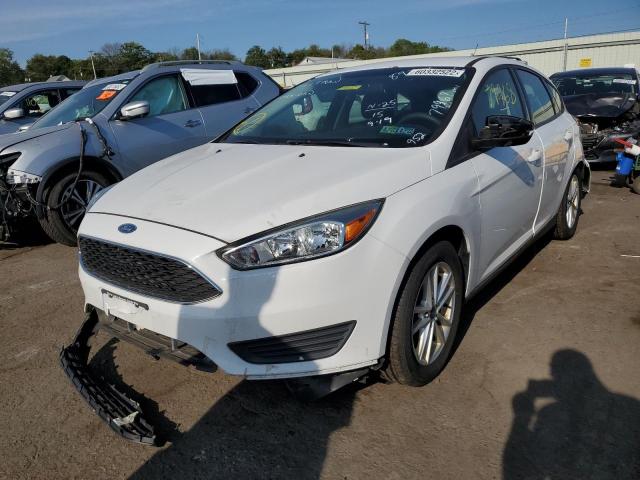 Photo 2 from auction – 2015 FORD FOCUS SE with VIN 1FADP3K29FL288952