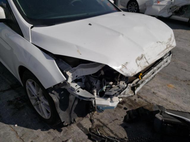 Photo 9 from auction – 2018 FORD FOCUS SE with VIN 1FADP3F26JL212589