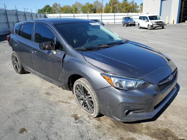 SUBARU IMPREZA 2018 with VIN 4S3GTAA61J3745256 - Photo from auction