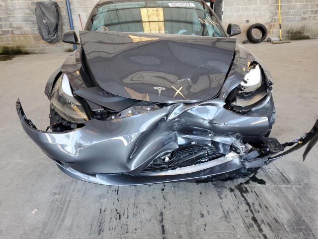 Photo 9 from auction – 2022 TESLA MODEL 3 with VIN 5YJ3E1EB0NF333550