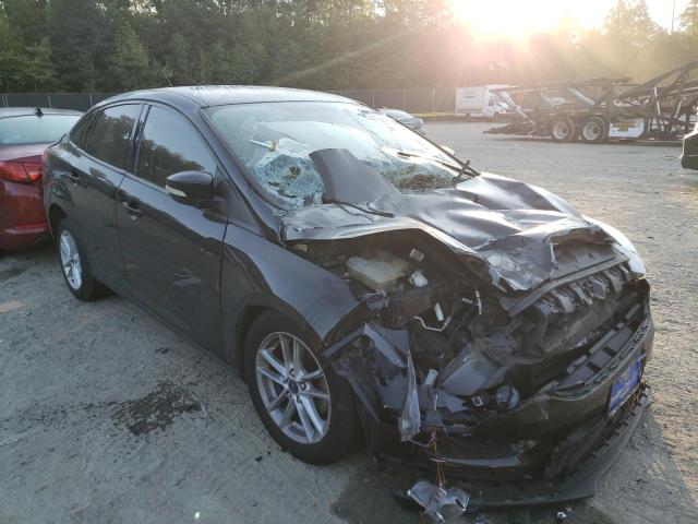 FORD FOCUS SE 2017 with VIN 1FADP3F24HL242684 - Photo from auction
