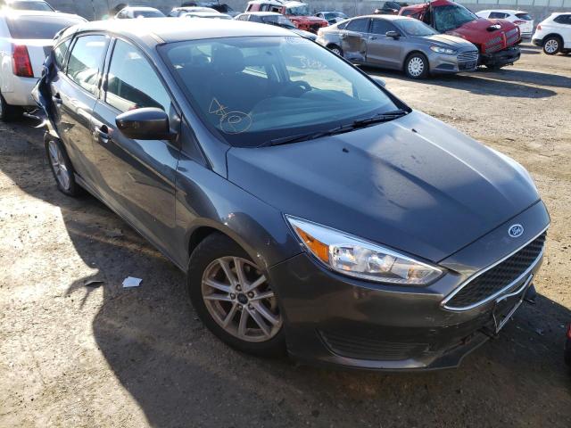 FORD FOCUS SE 2018 with VIN 1FADP3K29JL260139 - Photo from auction