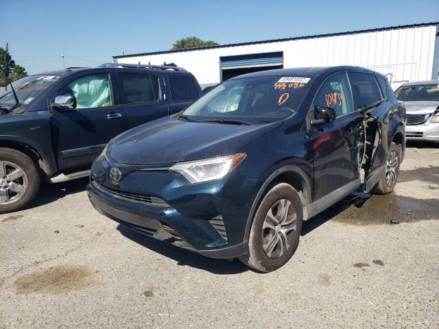 Photo 2 from auction – 2018 TOYOTA RAV4 LE with VIN 2T3ZFREV2JW414084
