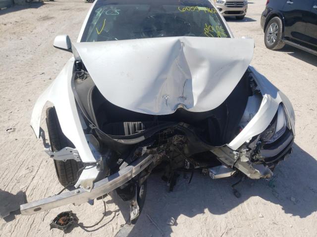Photo 9 from auction – 2021 TESLA MODEL 3 with VIN 5YJ3E1EA2MF095397