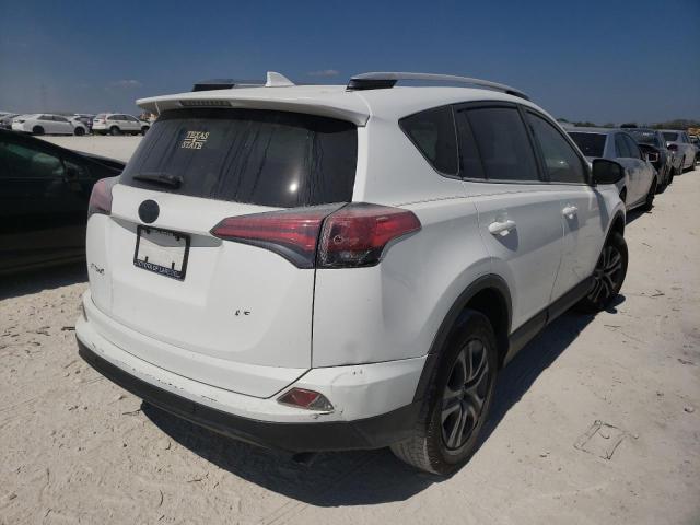 Photo 4 from auction – 2016 TOYOTA RAV4 LE with VIN JTMZFREV3GJ067422