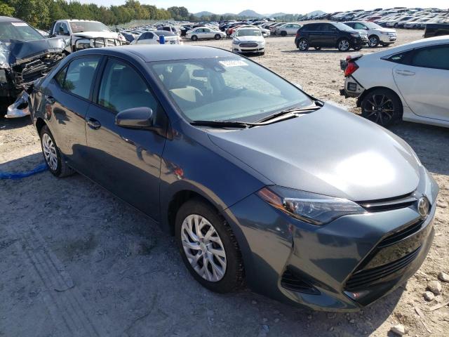 TOYOTA COROLLA L 2018 with VIN 5YFBURHE7JP817619 - Photo from auction