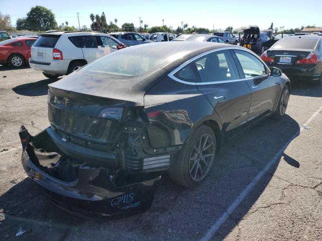Photo 4 from auction – 2018 TESLA MODEL 3 with VIN 5YJ3E1EA1JF070373