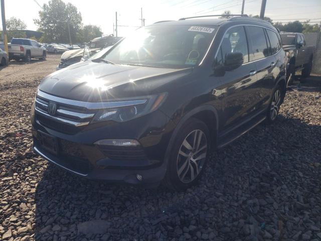 Photo 2 from auction – 2016 HONDA PILOT TOUR with VIN 5FNYF6H92GB097611