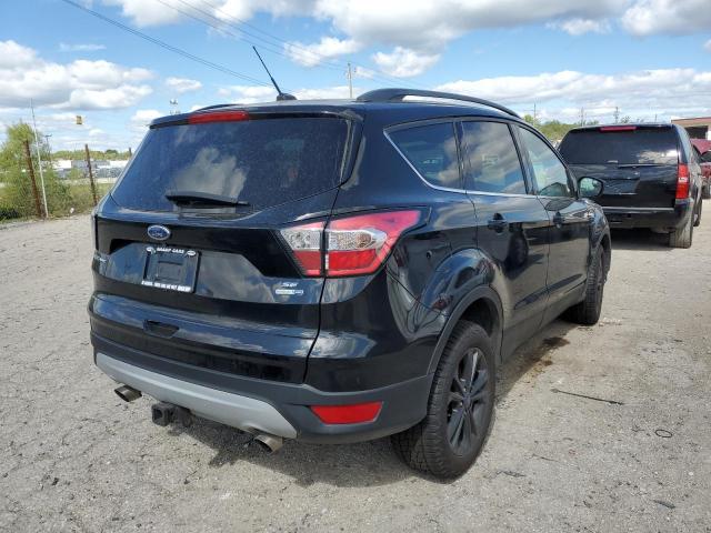 Photo 4 from auction – 2017 FORD ESCAPE SE with VIN 1FMCU9G99HUD70549