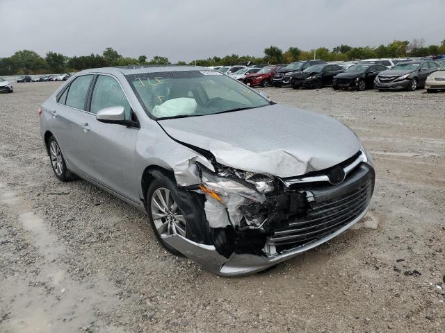 TOYOTA CAMRY LE 2017 with VIN 4T1BF1FK3HU694074 - Photo from auction