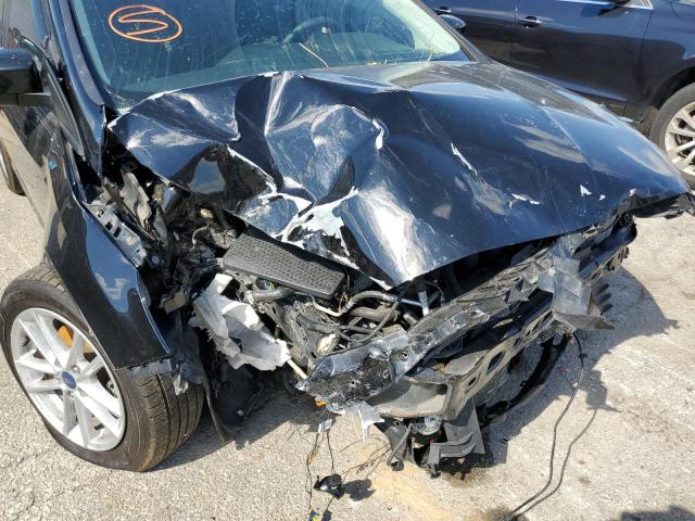 Photo 9 from auction – 2018 FORD FOCUS SE with VIN 1FADP3F24JL320984