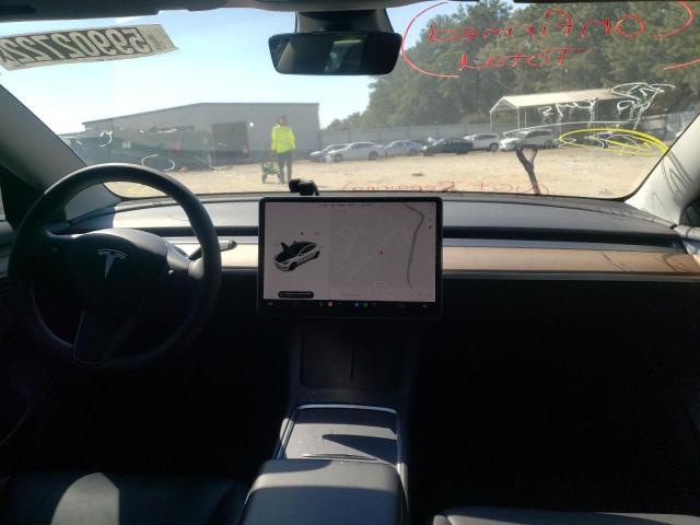 Photo 9 from auction – 2021 TESLA MODEL 3 with VIN 5YJ3E1EA6MF085682