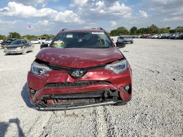 Photo 9 from auction – 2018 TOYOTA RAV4 SE with VIN JTMJFREV9JD236409