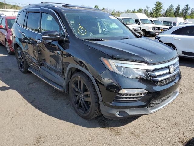 HONDA PILOT TOUR 2016 with VIN 5FNYF6H97GB077869 - Photo from auction