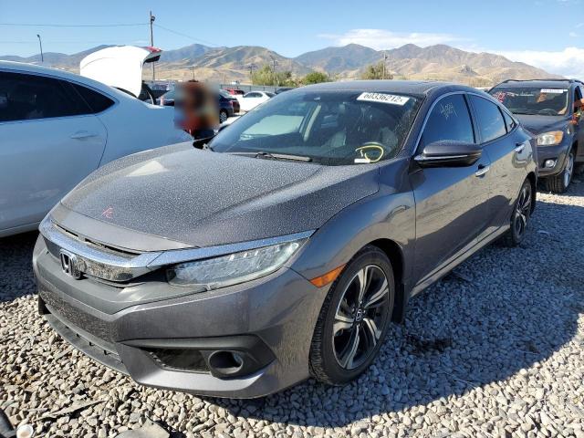 Photo 2 from auction – 2017 HONDA CIVIC TOUR with VIN 19XFC1F92HE015258