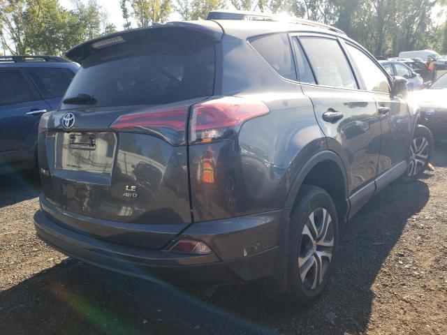 Photo 4 from auction – 2017 TOYOTA RAV4 LE with VIN JTMBFREV5HJ107938