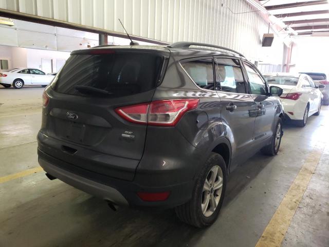 Photo 4 from auction – 2016 FORD ESCAPE SE with VIN 1FMCU9GX2GUC75988
