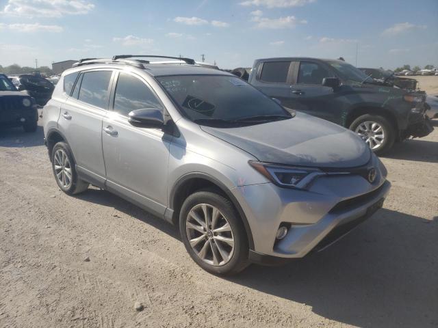 TOYOTA RAV4 LIMIT 2018 with VIN 2T3YFREV9JW459874 - Photo from auction